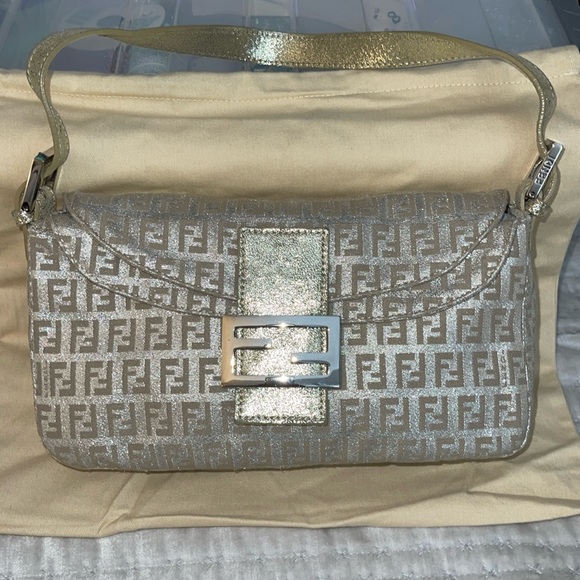 Fendi Handbags - Fendi Baguette excellent condition silver shimmers and beige color beautiful bag